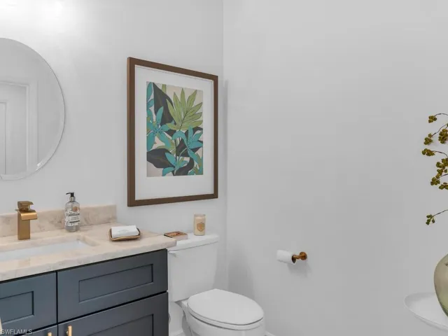 Bathroom with vanity and toilet