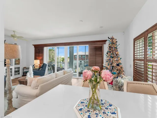 Dining space featuring a wealth of natural light, hardwood / wood-style floors, and ceiling fan