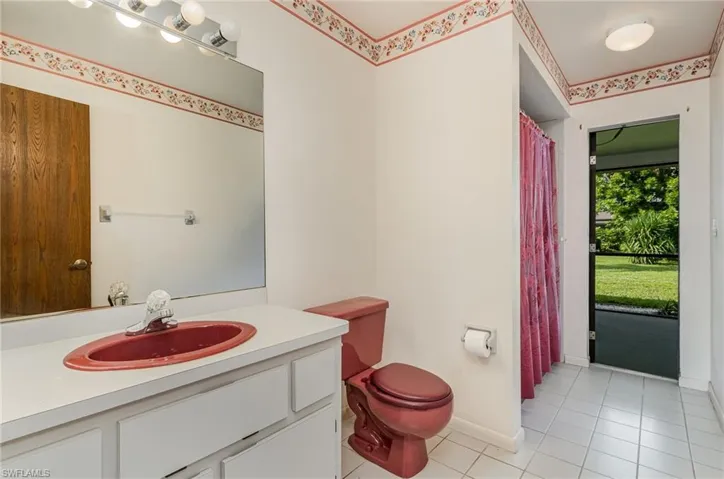 Full guest bathroom with access to the screened lanai