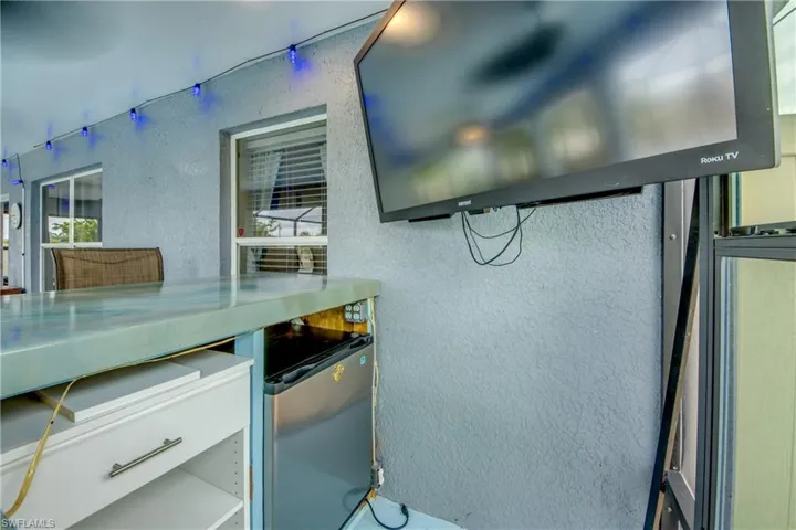 Room details with stainless steel fridge