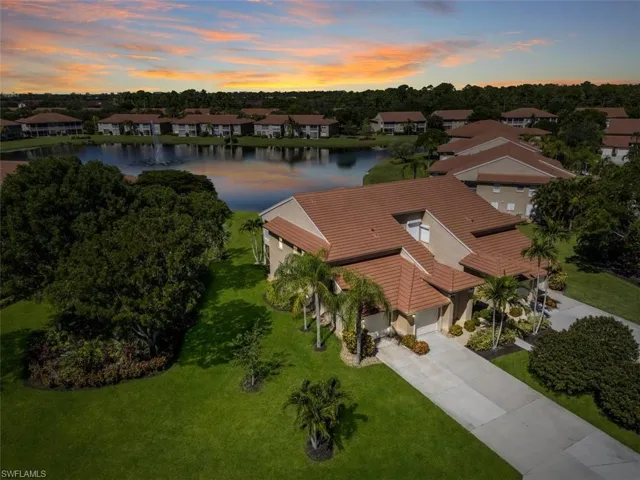Aerial view at dusk of a residential view and a water view
