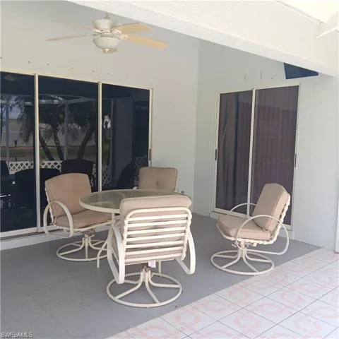 View of patio with ceiling fan