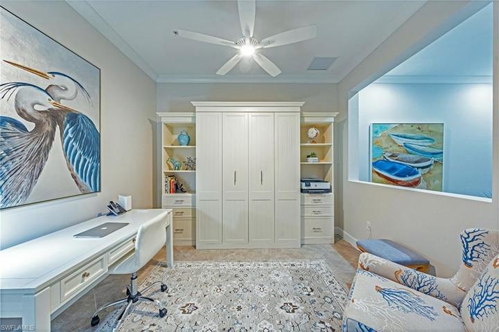 Den with Custom Cabinetry Murphy Bed