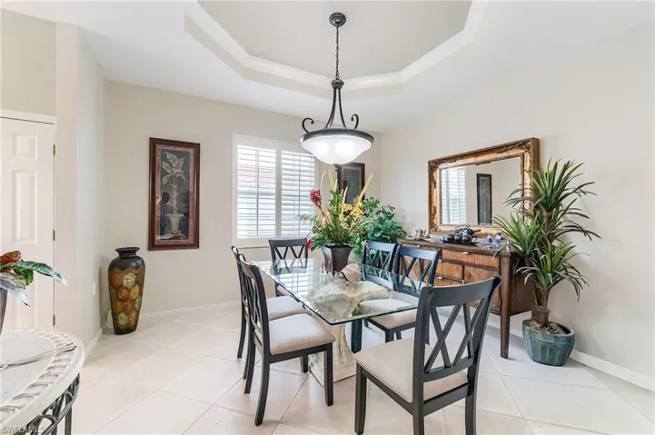 Formal dining area next to ketchen and family room