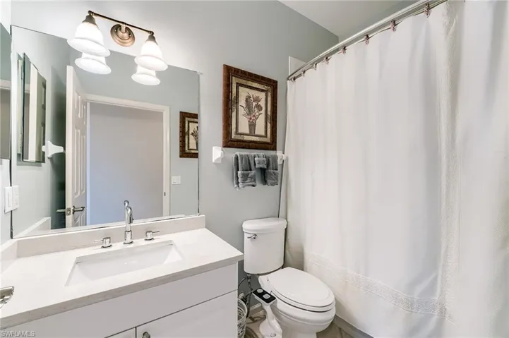 Guest bath in hallway by bedrooms 2 and 3