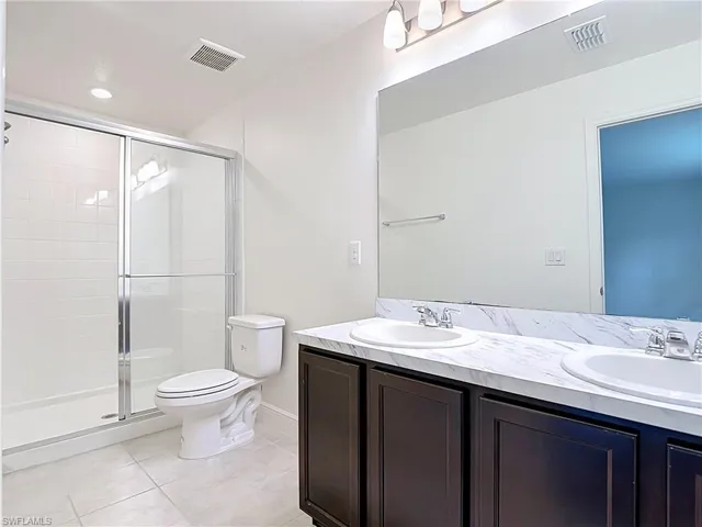 dual sinks and walk in shower