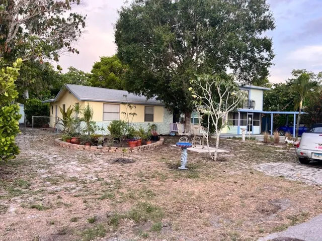 View of front of home featuring stucco siding