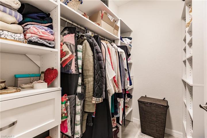 HER WALK IN CLOSET