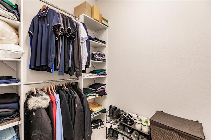 HIS WALK IN CLOSET
