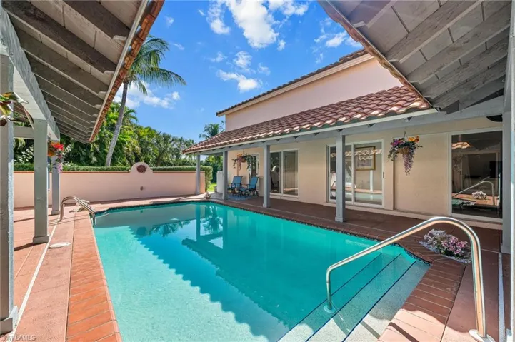 View of swimming pool with a patio