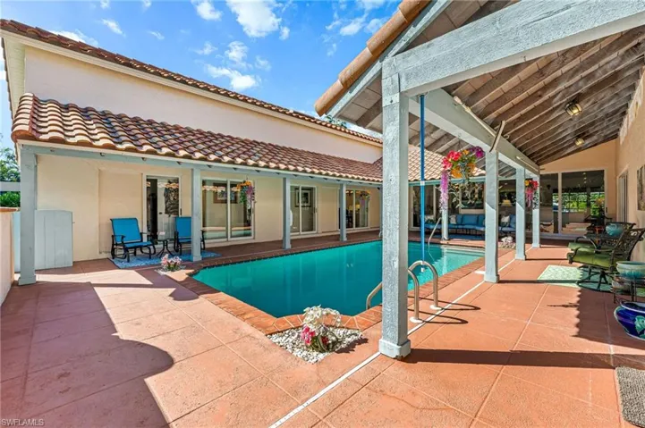 Outdoor pool featuring a patio