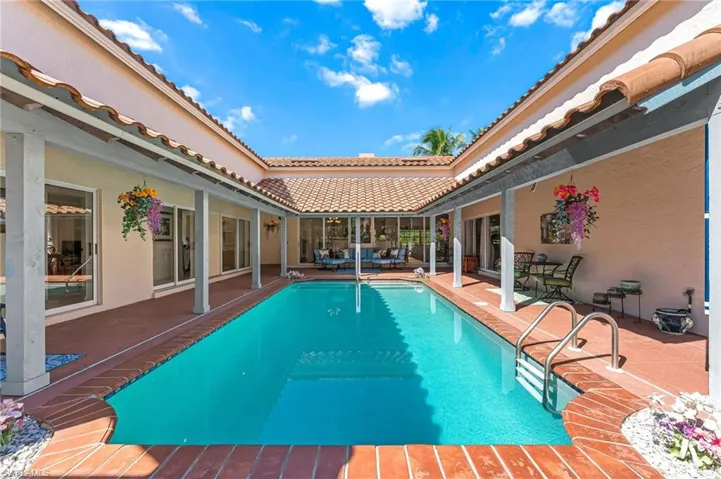 Outdoor pool featuring a patio area