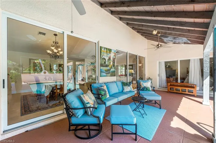View of patio featuring a ceiling fan and outdoor lounge area