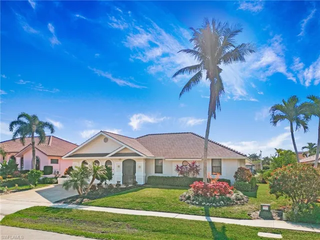 Ranch-style home with a front yard
