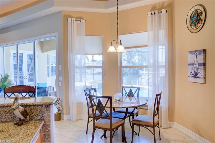 “Casual Dining with Pool and Canal Views”