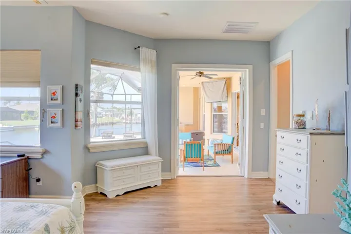 “Tranquil Retreat with Pool Access”Spacious and serene, with sliding doors to the lanai and room for a sitting area.