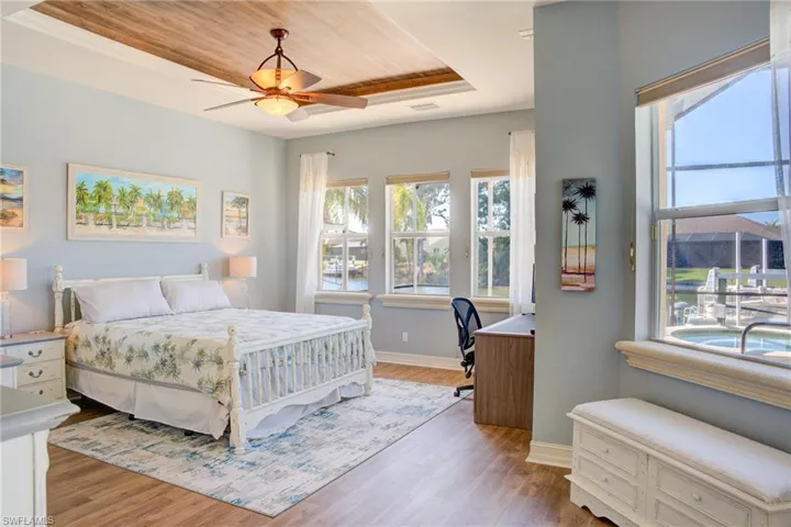 “Tranquil Retreat with Pool Access”Spacious and serene, with sliding doors to the lanai and room for a sitting area.