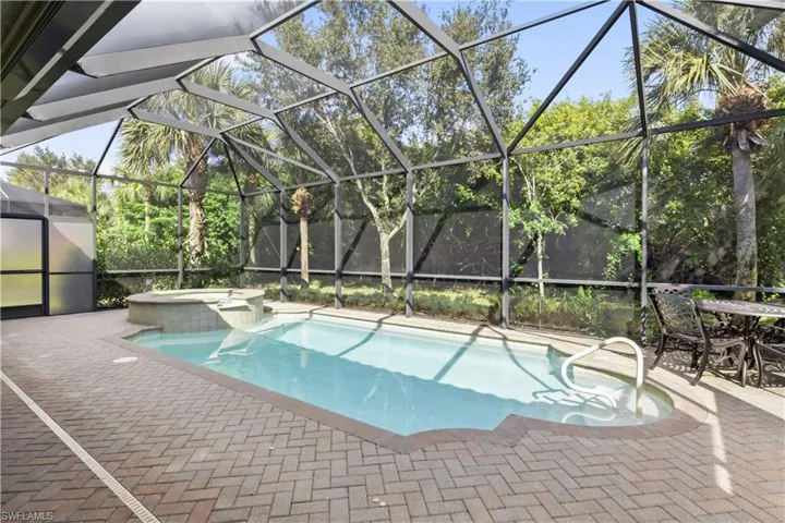 Relax and unwind in your pool and spa while enjoying scenic preserve views and Florida sunsets.
