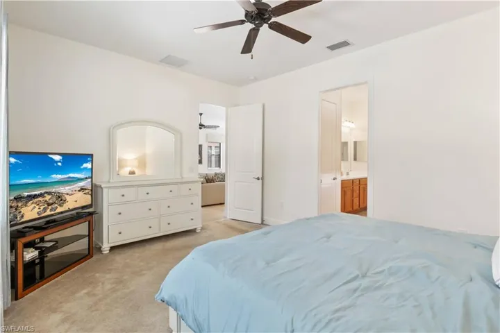 Tranquil primary suite with walk-in closet and luxurious en-suite bathroom.