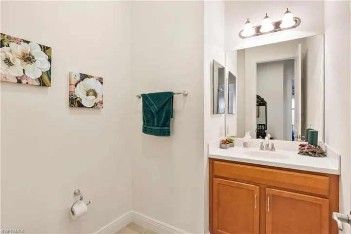 Powder room designed for style and accessibility, ideal for visitors.