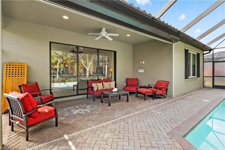 Your private oasis: screened-in lanai with pool and spa, ideal for morning coffee, entertaining, or relaxing under the Florida sun.”