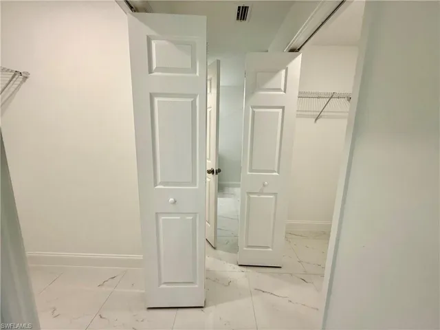 Dual walk in closets.