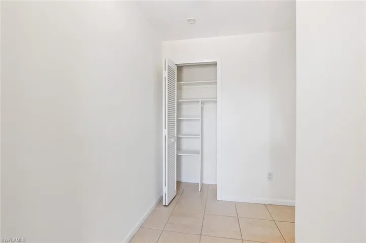 Front entry foyer with tile flooring in unit #3.