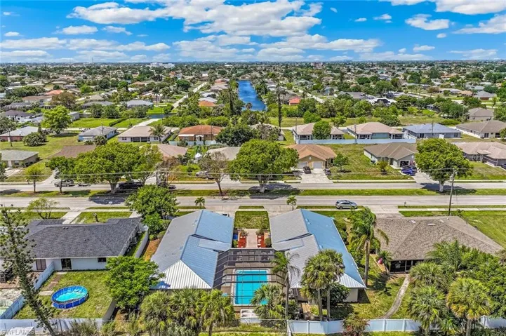 Aerial view of the rear of the property looking west.