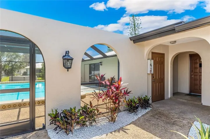 Main entry into pool/screened lanai area.