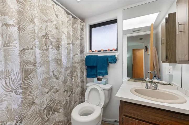 Bathroom two with tile flooring in unit #1.