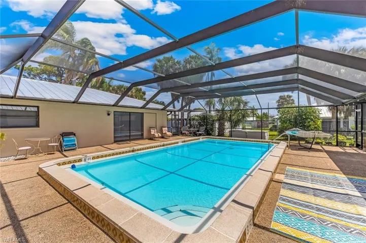 Inground pool with new screened lanai.