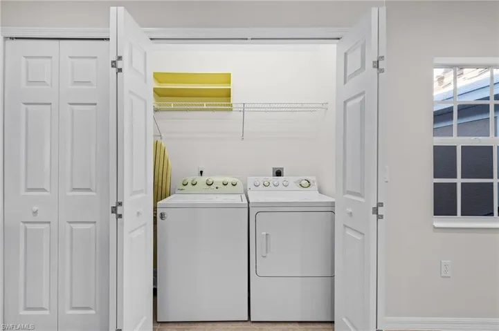 Laundry room with separate washer and dryer