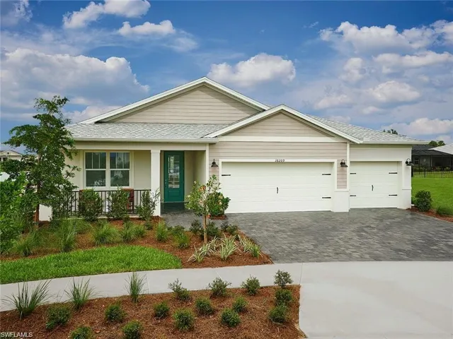 Ranch-style home featuring decorative driveway, a garage, a porch, a shingled roof, and stucco siding