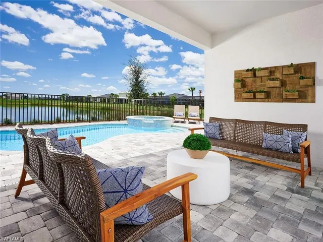 Dining space featuring wood finish floors and a water view