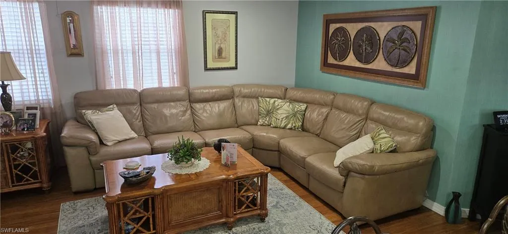 Living area featuring wood finished floors