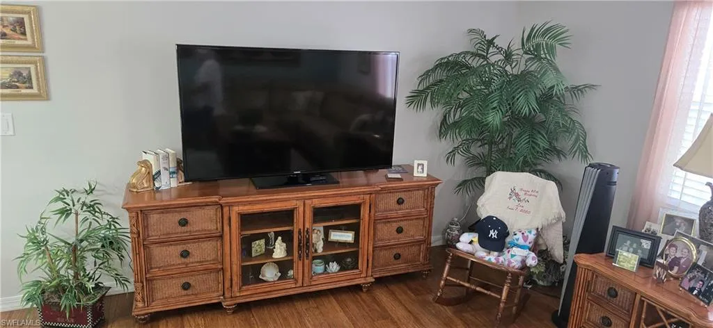 Sitting room featuring wood finished floors