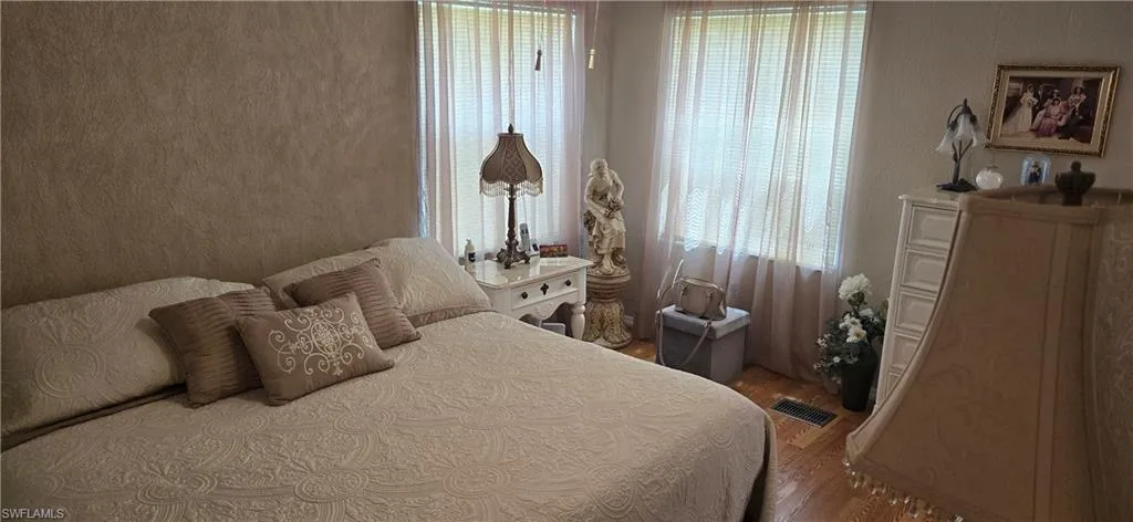 Bedroom featuring wood finished floors