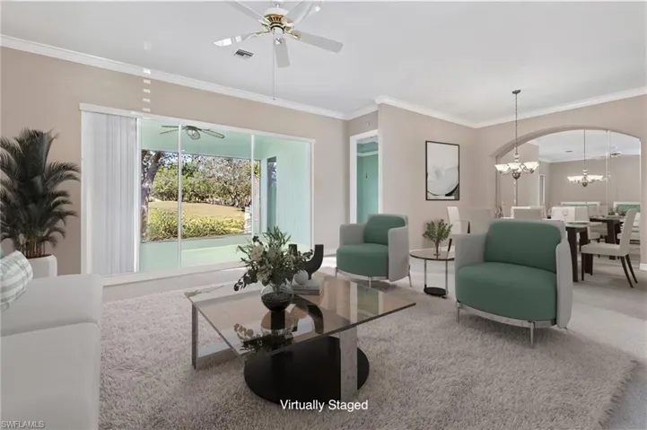 Virtually staged living room and dining room.