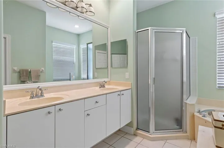 Master Bathroom with separate shower and tub.