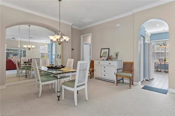 Mirrored dining room just of of the kitchen.