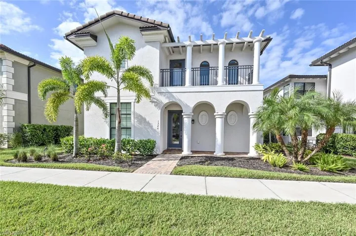 Front of the house.... Naples blue skies