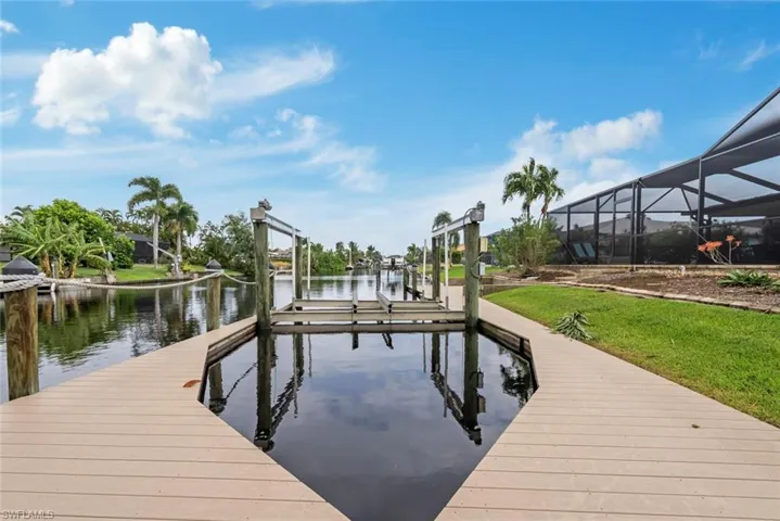 Dock area featuring a water view and a lanai