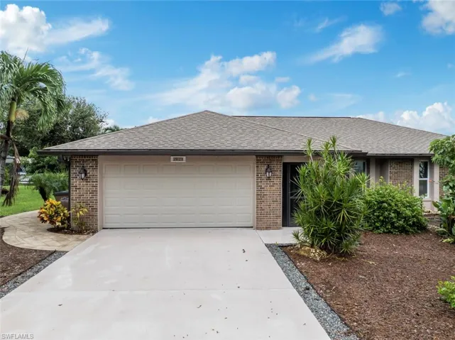 Ranch-style house with a garage