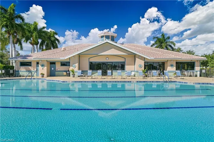 Community pool with a patio area