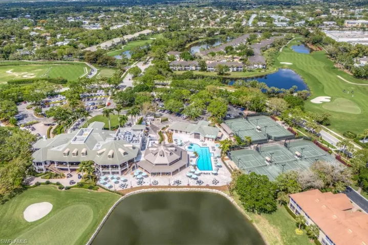 Bird's eye view with a water view and golf course view