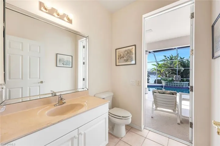 Bathroom with vanity and light tile patterned floors