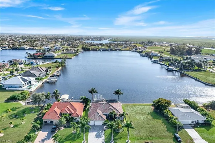 Aerial perspective of suburban area and Lavedo Lake