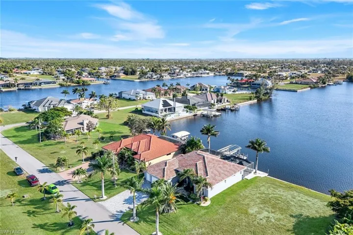 Aerial perspective of suburban area and Lavedo lake