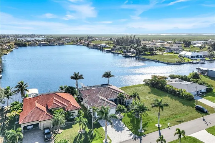Aerial view of residential area featuring gulf access Lavedo Lake