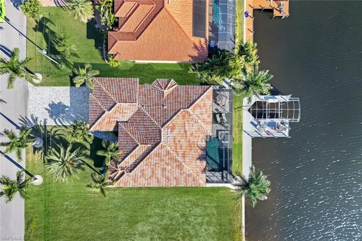 View from above of property featuring concrete tile roof